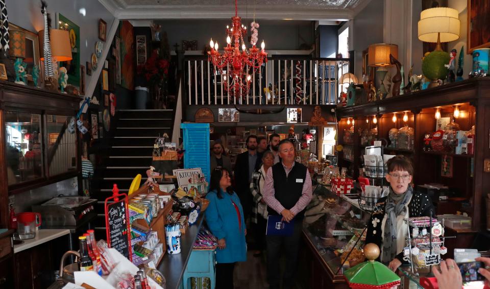Owner Angie Pattengale talks about the history of the building during a shop small walking tour, Thursday, Nov. 9, 2023, at McCord’s Candies in Lafayette, Ind.