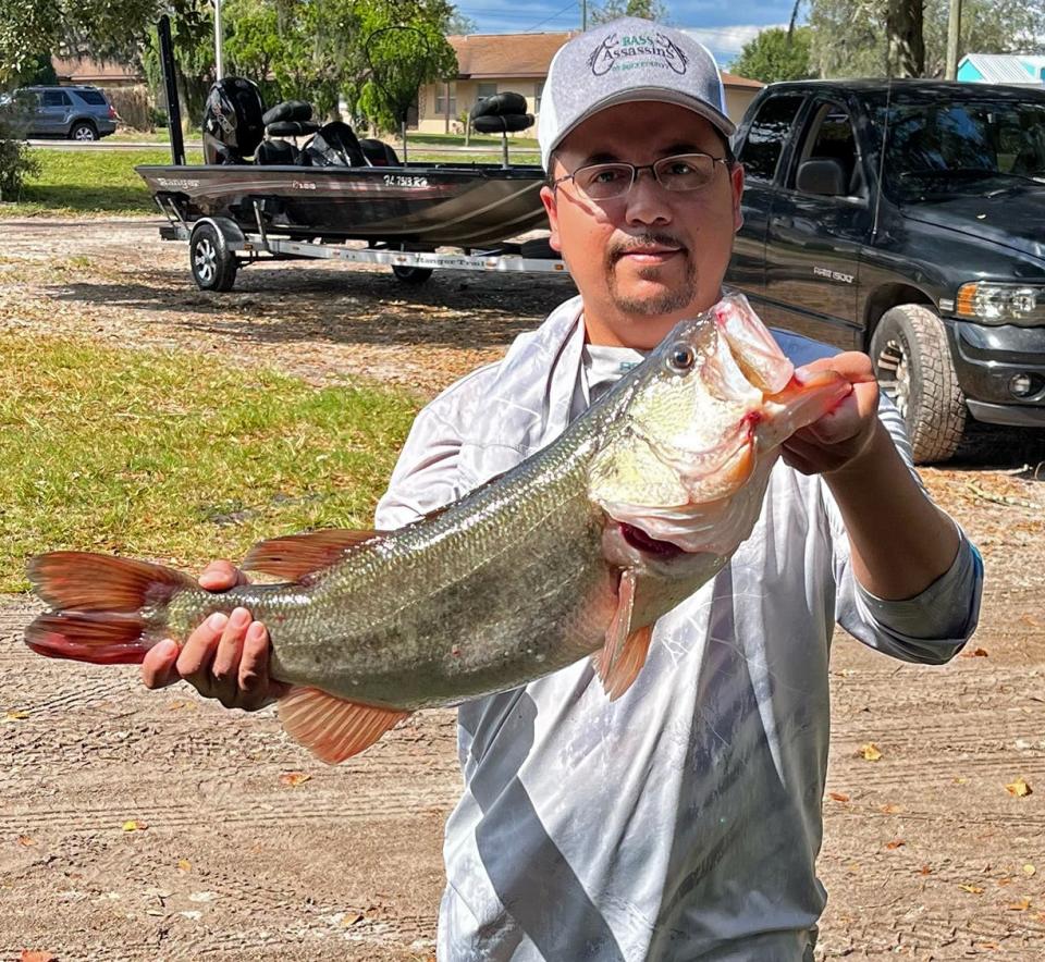 Daniel Garcia took big bass with this 7.87 pounder to help him and his partner Ishmael Garcia to a total weight of 15.43 pounds and a first place finish during the Bass N Boats tournament Oct. 15 on the Winter Haven North Chain. 
