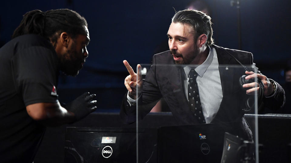 Dan Hardy, pictured here speaking to Herb Dean at UFC Fight Night.