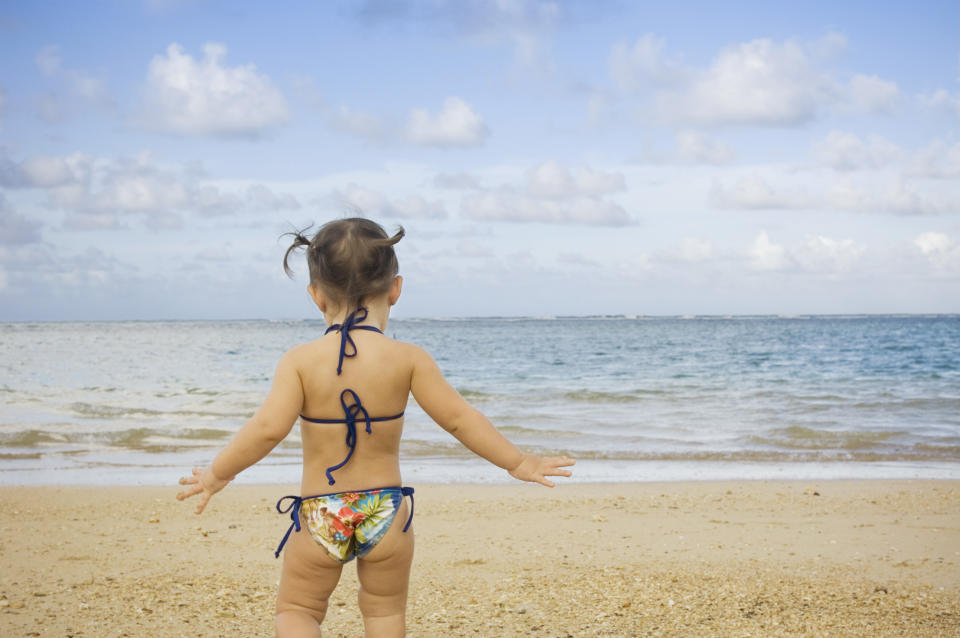 A mum has started a debate online about whether toddlers should wear bikinis [Photo: Getty]