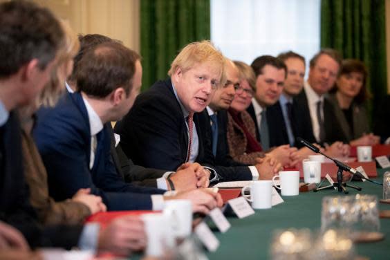 Boris Johnson speaks during his first cabinet meeting since the general election (AP)