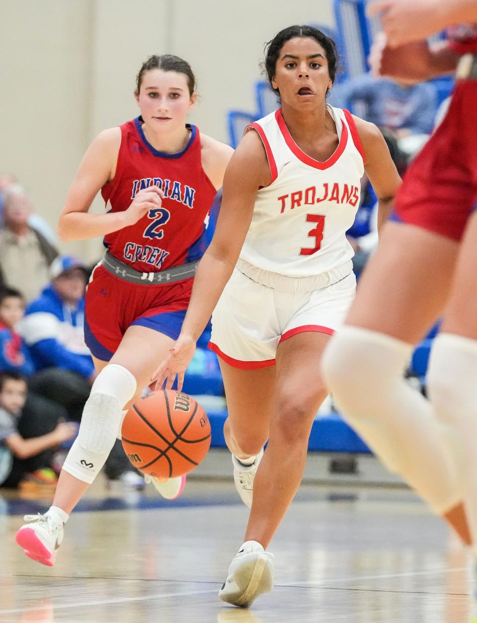 Center Grove Trojans Aubrie Booker (3) rushes up the court Thursday, Nov. 16, 2023, during the semifinals of the Johnson County Tournament at Franklin Community High School in Franklin. The Center Grove Trojans defeated Indian Creek, 61-52.