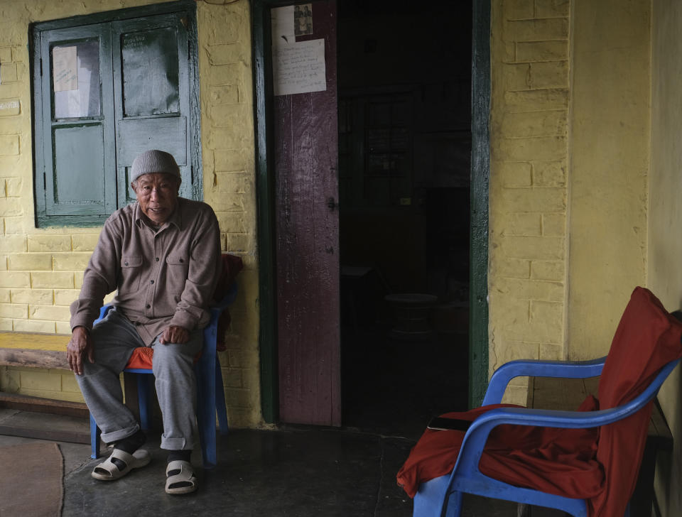 B.K. Sachu, an 86-year-old Angami Naga, recounts his memories of the World War II battle between the Japanese and British Commonwealth forces in his village, as he sits outside his house in Kohima village, India, Wednesday, Aug. 12, 2020. While many Nagas supported the allied forces, others backed the Japanese with whom they shared some physical features and in the hope that they would help the Nagas achieve the independence they sought from British colonial rule. Sachu recalled the kindness of a doctor who "could not watch children suffer, he would treat them. From him I understood how good the Japanese were,” he said. (AP Photo/Yirmiyan Arthur)