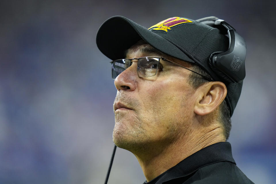 Washington Commanders head coach Ron Rivera checks the replay screen in the second half of an NFL football game against the Indianapolis Colts in Indianapolis, Fla., Sunday, Oct. 30, 2022. (AP Photo/AJ Mast)