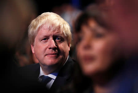 Britain's Foreign Secretary Boris Johnson sits in the auditorium at the Conservative Party conference in Manchester, Britain October 3, 2017. REUTERS/Phil Noble