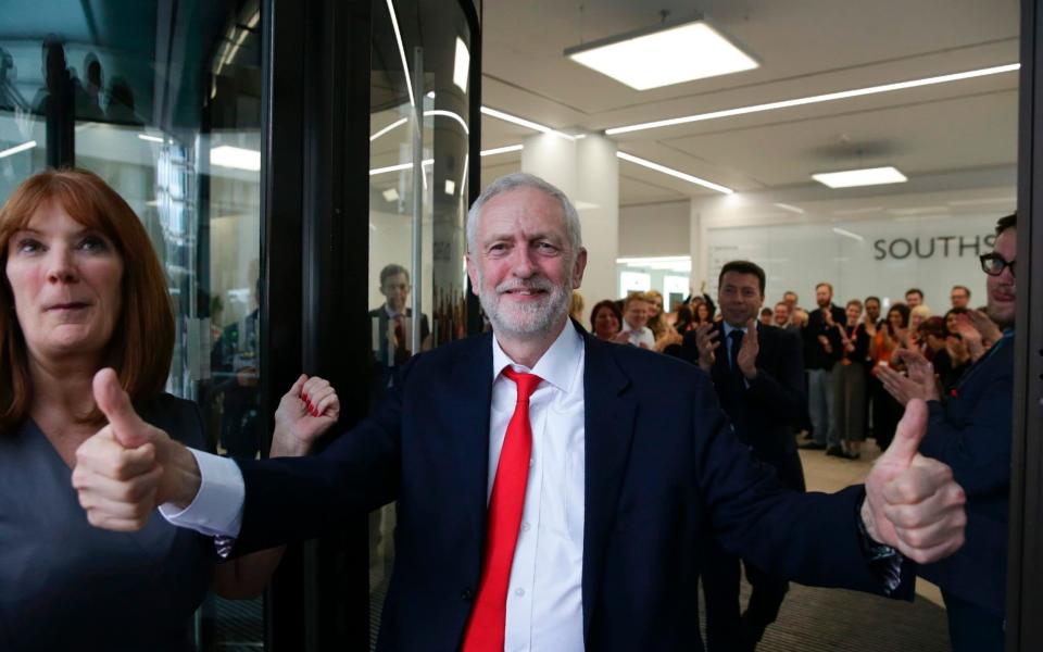 Leader Jeremy Corbyn gives a thumbs up - Credit:  AFP PHOTO / Daniel
