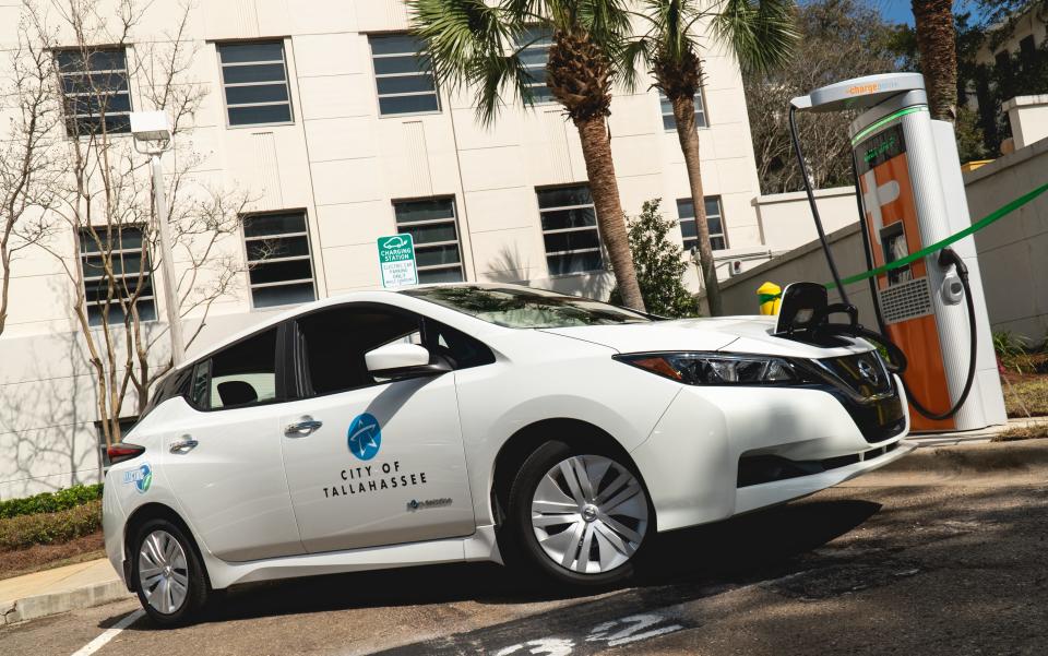 Charging up a member of the city's electric fleet.