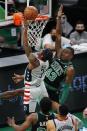 Washington Wizards' Bradley Beal (3) shoots against Boston Celtics' Javonte Green (43) during the second half of an NBA basketball game, Sunday, Feb. 28, 2021, in Boston. (AP Photo/Michael Dwyer)