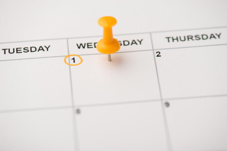 thumbtack on Wednesday on a calendar