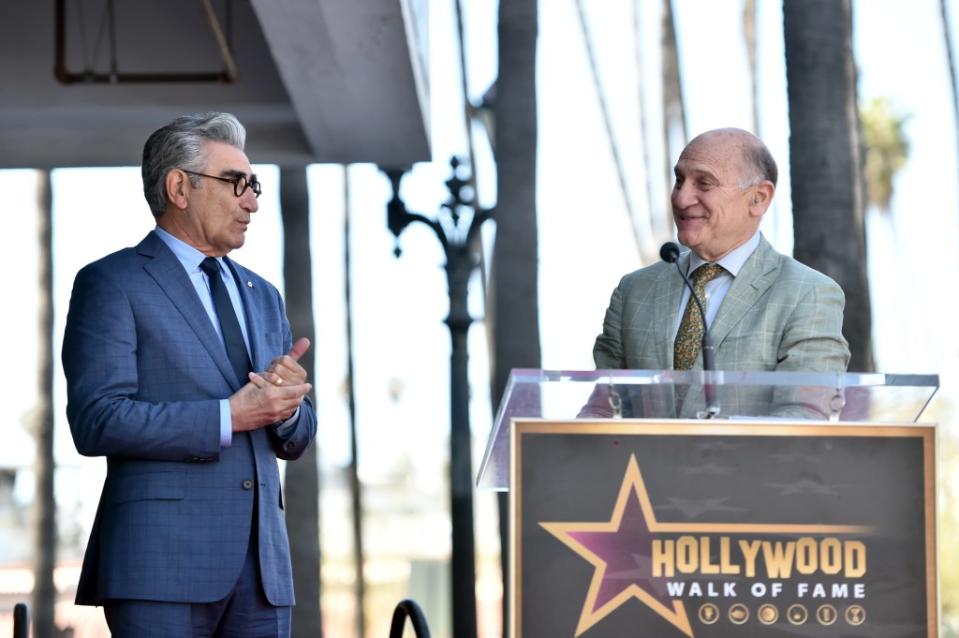 HOLLYWOOD, CALIFORNIA – MARCH 08: (L-R) Eugene Levy and Steve Nissen, President and CEO, Hollywood Chamber of Commerce speak onstage during the ceremony honoring Eugene Levy with a Star on the Hollywood Walk of Fame on March 08, 2024 in Hollywood, California. (Photo by Alberto E. Rodriguez/Getty Images)