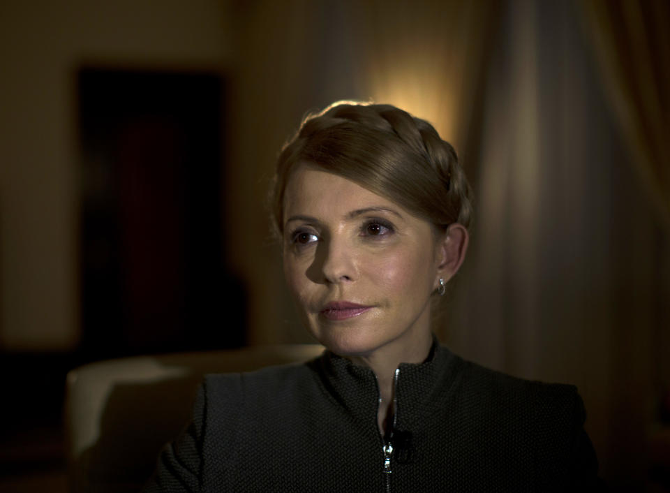 Former Ukrainian Prime Minister Yulia Tymoshenko poses for a photo during an interview with the Associated Press in Kiev, Ukraine, Wednesday, March 5, 2014. Tymoshenko says the West must force Russia to withdraw troops from the Crimean peninsula and that Ukraine should not agree to any compromises with Russia. (AP Photo / Emilio Morenatti)