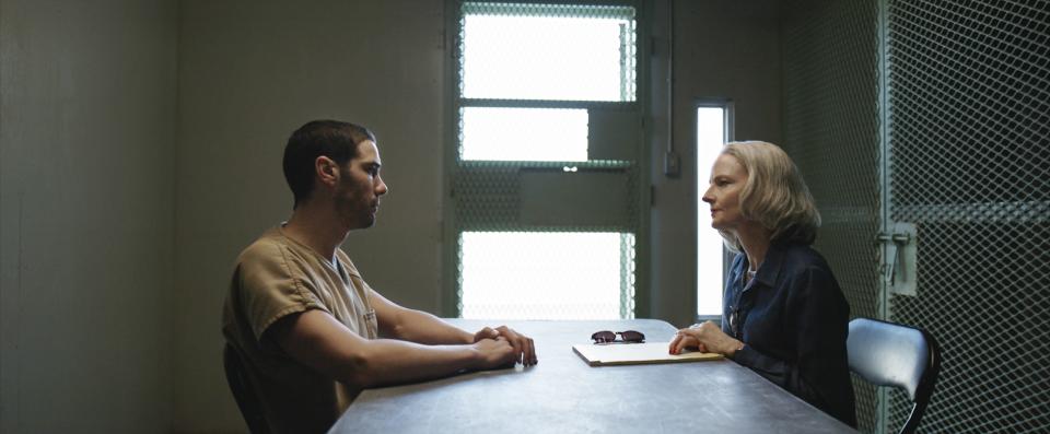 Longtime Guantanamo prisoner Mohamedou Ould Slahi (Tahar Rahim, left) sits down with his lawyer, Nancy Hollander (Jodie Foster) in a scene from "The Mauritanian."