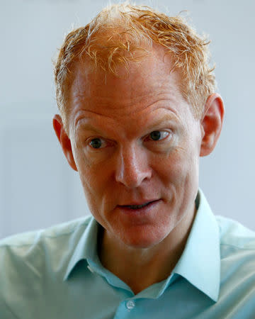 FILE PHOTO: Johann Gevers, founder and CEO of Monetas, attends an interview with Reuters in Zug, Switzerland, August 30, 2016. REUTERS/Arnd Wiegmann/File Photo