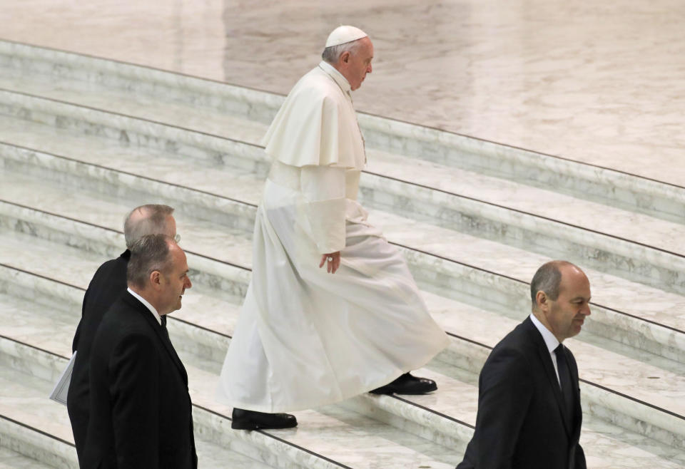 Pope Francis arrives in the Paul VI Hall at the Vatican for his weekly general audience, Wednesday, Feb. 20, 2019. (AP Photo/Alessandra Tarantino)