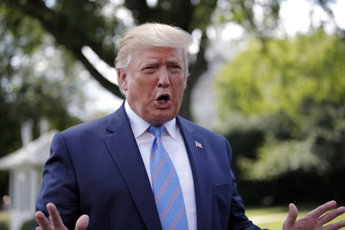 President Donald Trump speaks to reporters before departing the White House in Washington, Friday, Aug. 2, 2019, for the short trip to Andrews Air Force Base and onto his Bedminster, N.J., golf club. (AP Photo/Carolyn Kaster)
