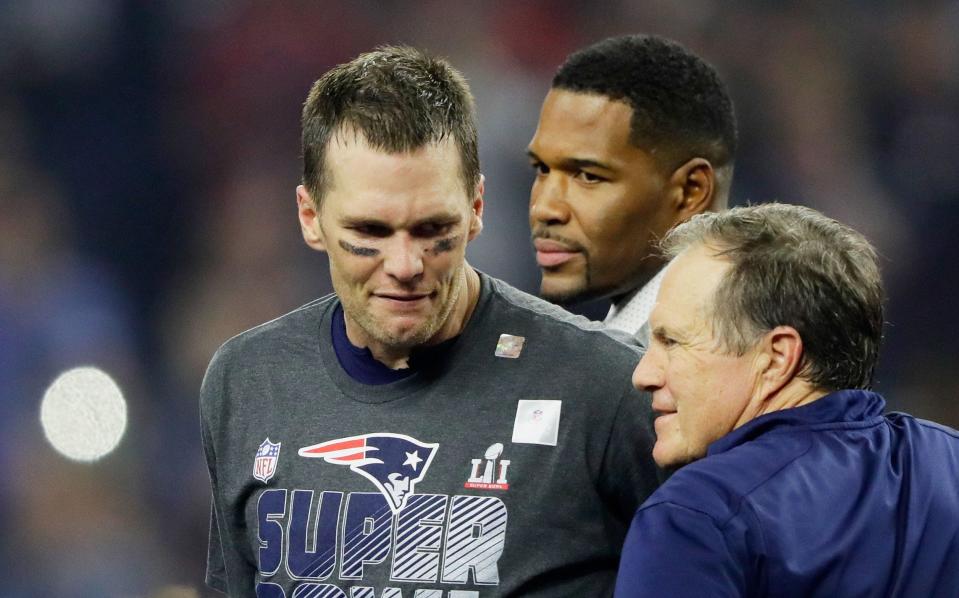 HOUSTON, TX - FEBRUARY 05:  Tom Brady #12 of the New England Patriots reacts with head coach Bill Belichick after defeating the Atlanta Falcons 34-28 in overtime to win Super Bowl 51 at NRG Stadium on February 5, 2017 in Houston, Texas.  (Photo by Jamie Squire/Getty Images)