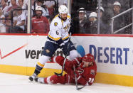 GLENDALE, AZ - MAY 07: Shea Weber #6 of the Nashville Predators lays a check onto Lauri Korpikoski #28 of the Phoenix Coyotes in the first period of Game Five of the Western Conference Semifinals during the 2012 NHL Stanley Cup Playoffs at Jobing.com Arena on May 7, 2012 in Glendale, Arizona. (Photo by Christian Petersen/Getty Images)