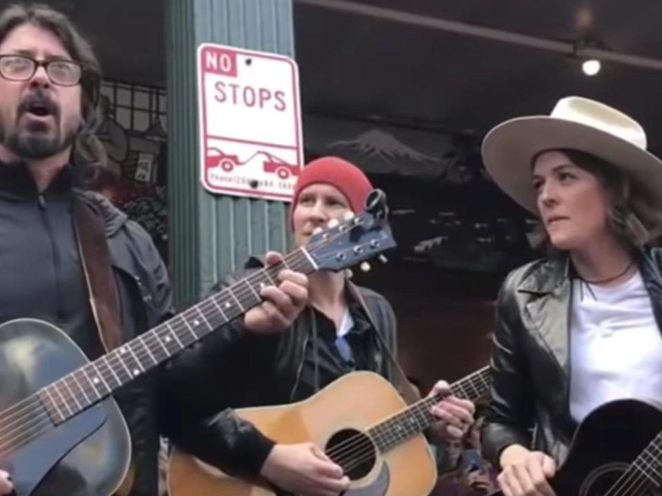 Dave Grohl and Brandi Carlile cover 'Let it Be' as Seattle buskers