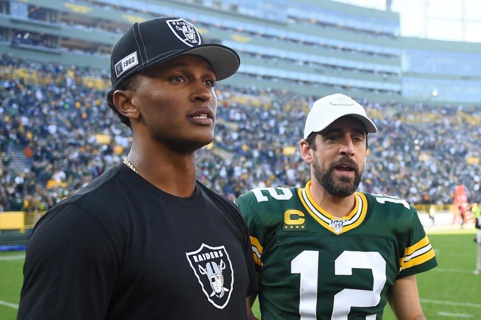 Aaron Rodgers and DeShone Kizer (Getty Images)
