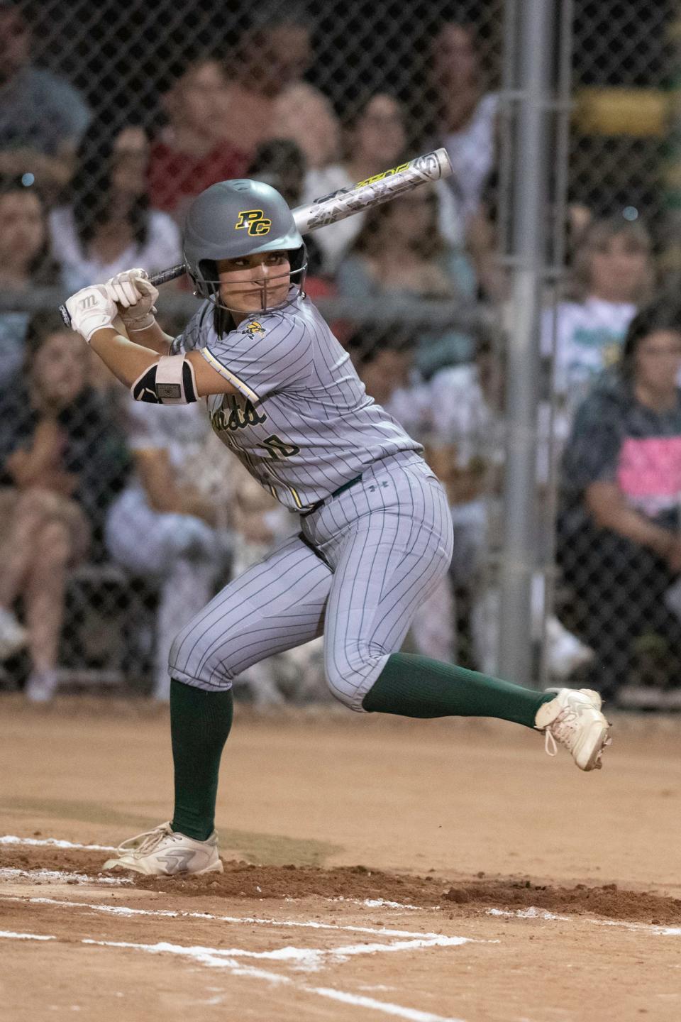 Pueblo County's Albanie Cordova prepares to swing on a pitch during a game against Pueblo East on Thursday, September 28, 2023.