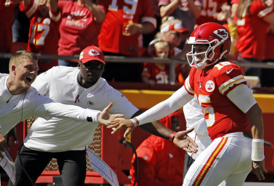 Kansas City Chiefs quarterback Patrick Mahomes (15) reacts to his second touchdown pass against the San Francisco 49ers in an NFL football game, in Kansas City, Sunday, Sept. 23, 2018. (AP Photo/Charlie Riedel)