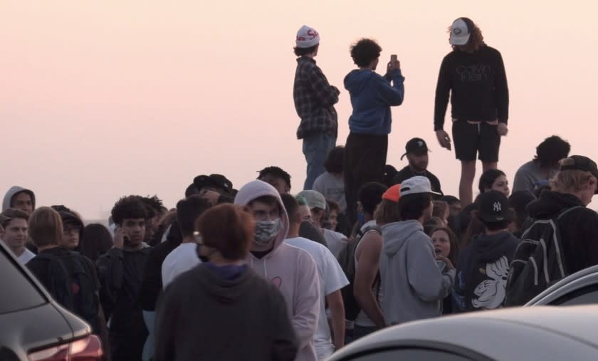 Roughly 2,500 teens and young adults-some who say they drove for hours or flew in from other states-converged in Huntington Beach for "Adrian's kickback" after the invitation was picked up by TikTok's "For You" algorithm.