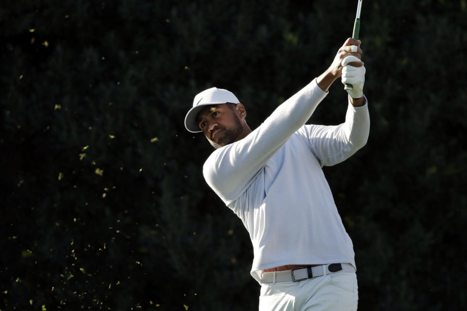 Tony Finau hits from the third tee during the first round of The American Express golf tournament at La Quinta Country Club Thursday, Jan. 16, 2020, in La Quinta, Calif. (AP Photo/Marcio Jose Sanchez)