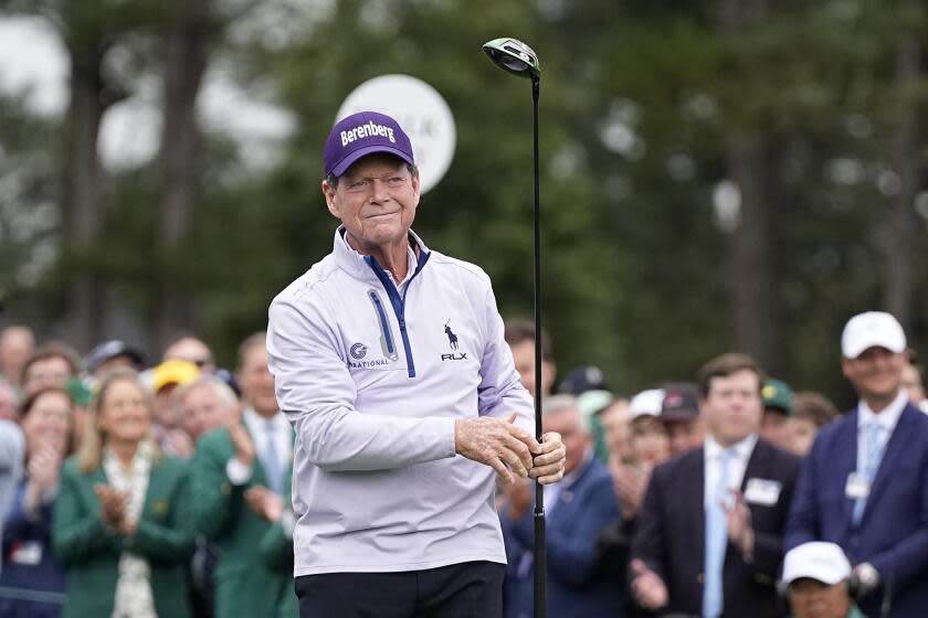 Honorary starter Tom Watson hits the ceremonial tee shot in the first hole during the first round.