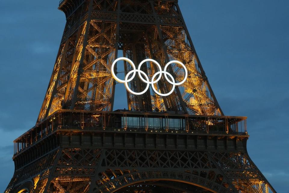 Jul 22, 2024, Paris, France; Olympic rings adorn the Eiffel Tower in advance of the 2024 Paris Olympic Games. Mandatory Credit: Kirby Lee-USA TODAY Sports