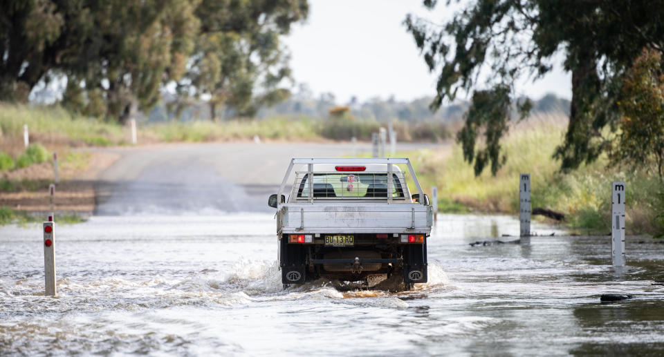 A ute in floodwaters.