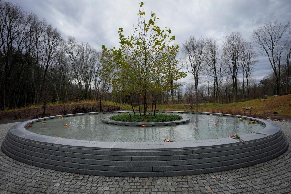 A memorial to the victims of the Sandy Hook Elementary School shooting, in Newtown, Conn., Sunday, Nov. 13, 2022. (AP Photo/Bryan Woolston)