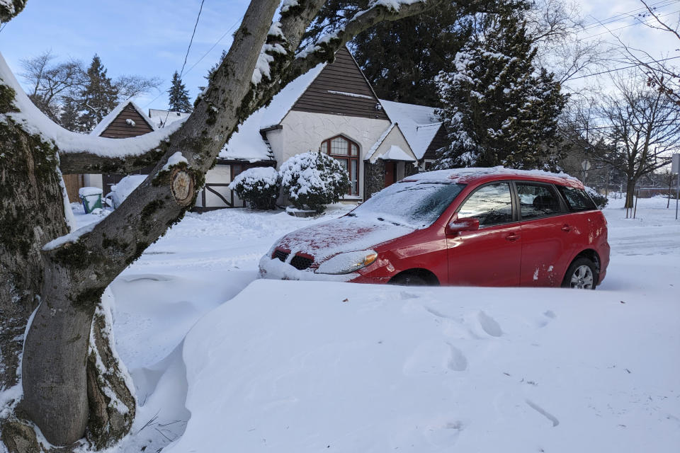 Snow covers a street in the Grant Park neighborhood of Portland, Ore., Thursday Feb. 23, 2023. Winter storms sowed more chaos across the U.S. on Thursday, shutting down much of Portland after the city experienced its second snowiest day in history and paralyzing travel from parts of the Pacific Coast all the way to the northern Plains. (AP Photo/Drew Callister)