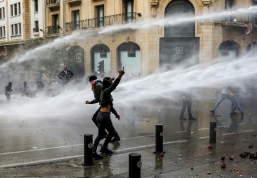 The naming of a new cabinet comes just over three months into a street protest movement demanding the departure of the entire political class