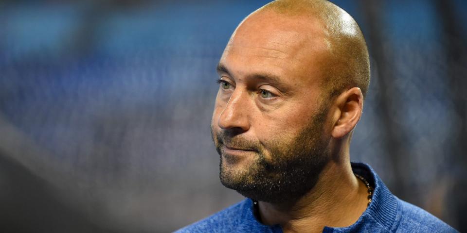 Deter Jeter purses his lips while looking on before an October 2021 Marlins game.