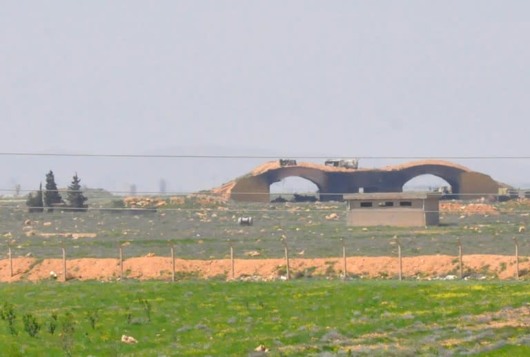 The damaged Shayrat airfield military base targeted US Tomahawk cruise missiles is seen on April 7, 2017, near the Syrian city of Homs