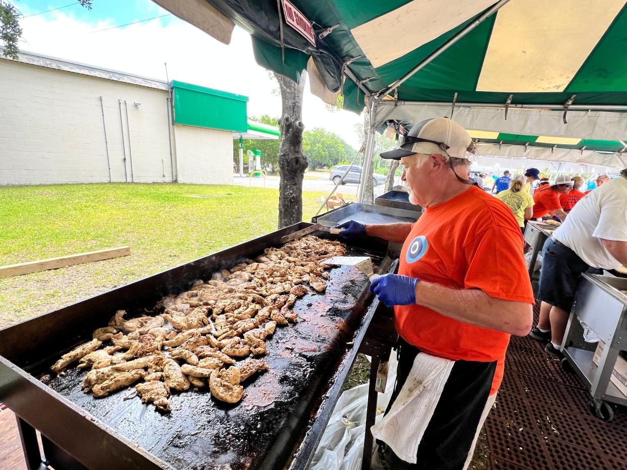 Lamb meat sizzles on the grill during the Wilmington Greek Festival held at St. Nicholas Greek Orthodox Church on Saturday, May 20, 2023.