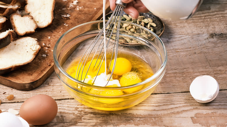 whisking eggs in a bowl