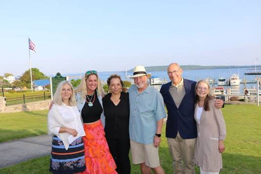 Winners of the 2022 Juried Art Exhibition Mackinac Journeys, (from left) Trish Morgan, Kelly Heck, juror Vera Grant, Raymond Gaynor, Tom Lewand and Cherie Correll, all recently visited Mackinac Island. Missing from the photo is winner Catherine McClung.