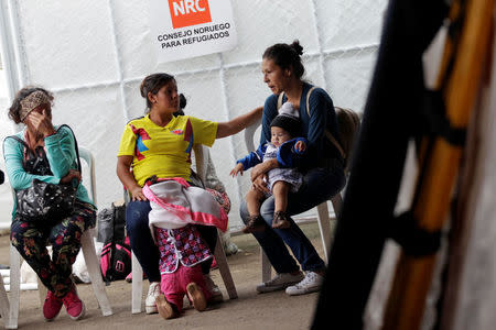 Women wait for medical attention at a shelter for Venezuelan migrants in Cucuta, Colombia August 8, 2018. REUTERS/Luisa Gonzalez