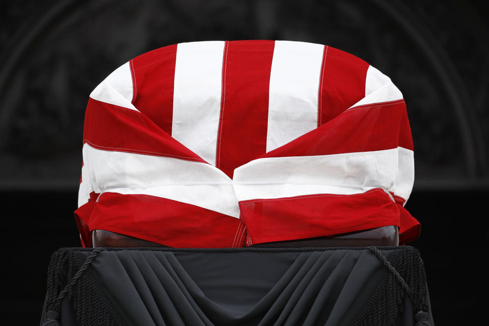 The flag-draped casket of Rep. John Lewis, D-Ga., lies in state on the East Front Steps of the Capitol in Washington, Tuesday, July 28, 2020. (AP Photo/Patrick Semansky)