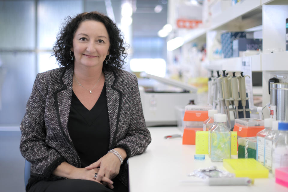 Megan Ford in a lab as the Executive Director of Clinical Trials at The Ingham Institute