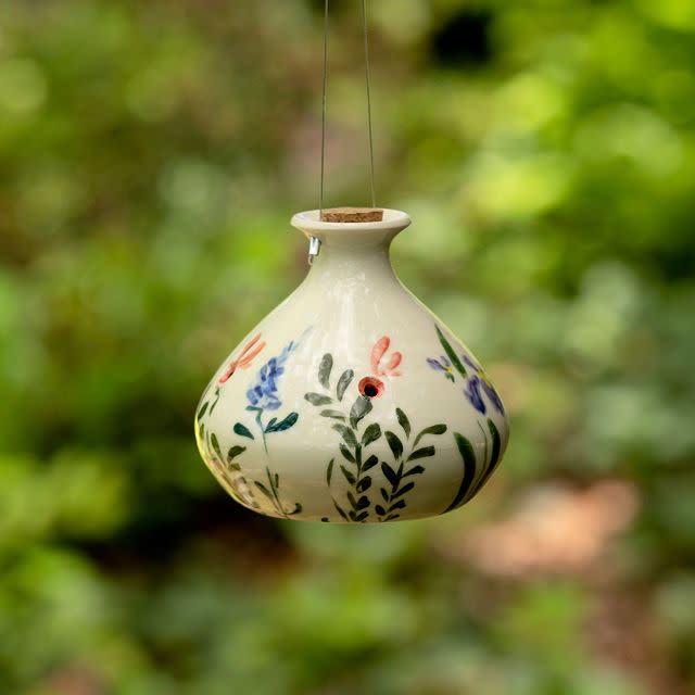 2) Hand-Painted Porcelain Feeder