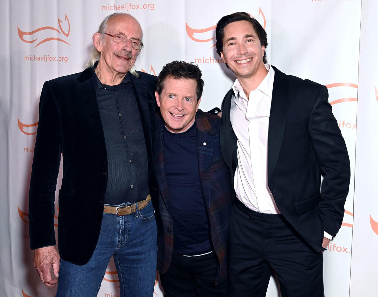 Christopher Lloyd, Michael J. Fox and Justin Long at the 2023 Michael J. Fox Foundation gala. (Bryan Bedder / Getty Images)