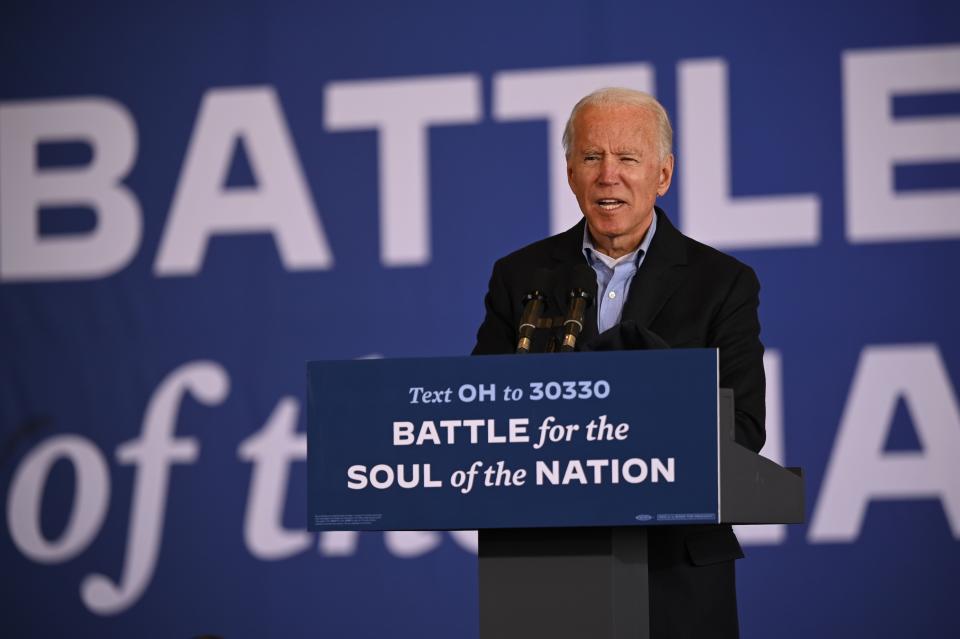 Democratic presidential candidate Joe Biden speaks at a drive-in get out the vote event at Burke Lakefront Airport on November 2, 2020 in Cleveland, Ohio.