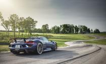 <p>Horsepower: 887; Weight: 3724 lb; Price as tested: $875,175<br><br></p><p>The 918 cracks 170 mph just after the main-straight kink, meaning that this slight bend, virtually unnoticed in the other cars, is a gut-knotting 1.0-g turn at 165 mph. One g at 165! That’s a number from real racing, the kind that has girls with umbrellas and live TV coverage. Needless to say, working up our nerve in this nearly million-dollar, 887-hp hybrid took some time. <a rel="nofollow noopener" href="http://www.caranddriver.com/features/porsche-918-spyder-at-lightning-lap-2014-feature" target="_blank" data-ylk="slk:READ MORE ››;elm:context_link;itc:0;sec:content-canvas" class="link ">READ MORE ››</a></p>