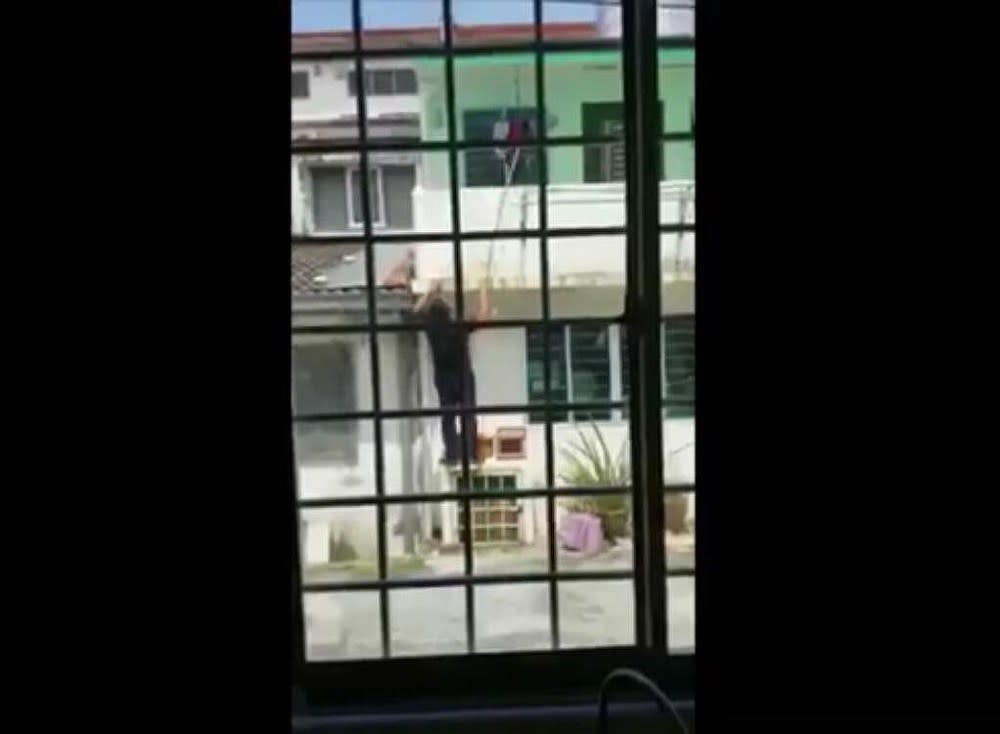 Screengrab of the 'underwear thief' caught on camera by a resident in SS 15 Subang Jaya. — YouTube/SubangJayaEcho image