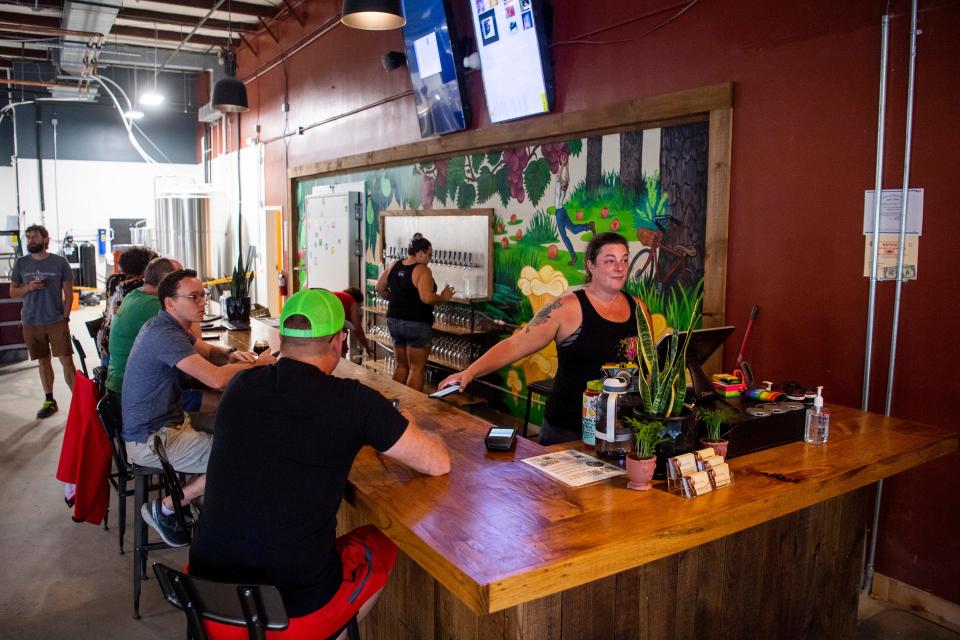 The bar and tap area inside Crafty Bastard Brewery’s second location now open at 9937 Kingston Pike off of the Pellissippi Parkway in West Knoxville on Thursday, July 1, 2021. 