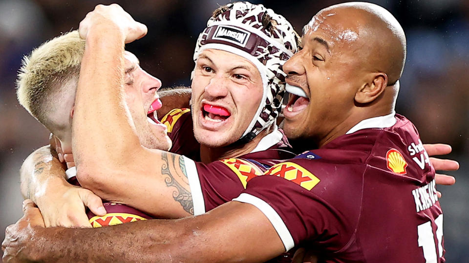 Cameron Munster, Kalyn Ponga and Felise Kaufusi, pictured here celebrating a try for Queensland in State of Origin I.