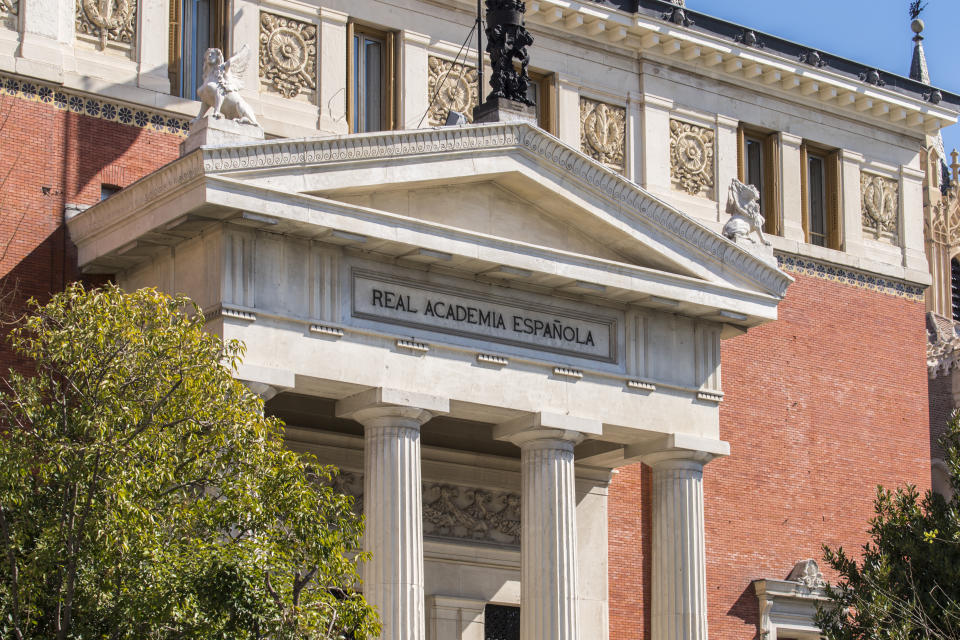 Upper part of the facade of the Real Academia Española (Royal Spanish Academy) building in the San Jeronimo district at Madrid city, Spain.