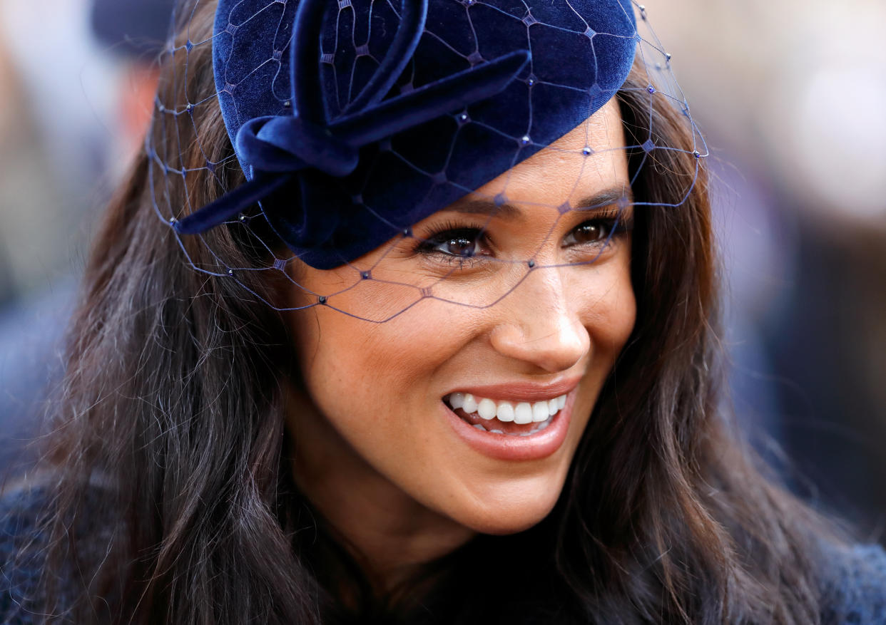 Meghan, Duchess of Sussex wears a blue hat and coat at the 91st Field of Remembrance at Westminster Abbey on November 7, 2019 in London, England.